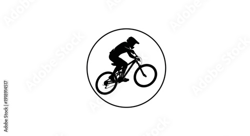 Mountain Biker Riding Downhill Silhouette.