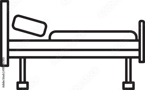 Hospital bed with clean white pillow, symbolizing patient care, medical treatment, and inpatient recovery.