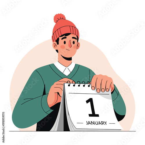 Man in winter hat flips calendar to January 1st New Year's Day start