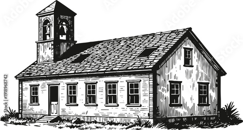 Vintage wooden schoolhouse with bell tower old country building with multiple windows and shingled roof in rural setting