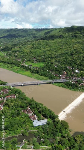 Wallpaper Mural Aerial View of River Bridge and Dam Through Lush Green Countryside With Villages and Mountains Torontodigital.ca