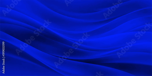 Smooth blue silk and satin fabric background featuring flowing waves of soft light and a shiny purple curve design with a liquid textile motion texture