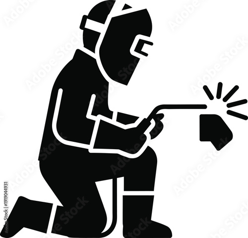 Silhouette Welder Kneeling Down Performing Arc Welding Work Safely