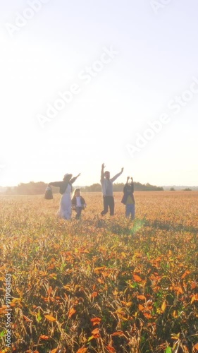 Joyful family gathering amid blooming flowers, Happy family shares moments among tall colorful blossoms outdoors