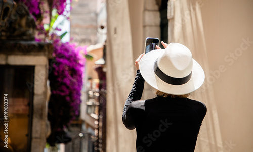 Wallpaper Mural woman tourist walking in quiant old town Torontodigital.ca