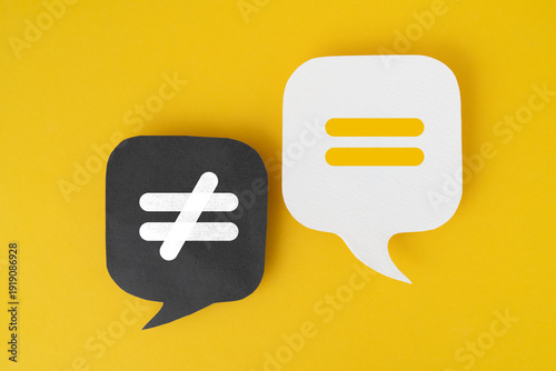 Obraz na płótnie yellow equal sign on white speech bubble and unequal sign on black speech bubble