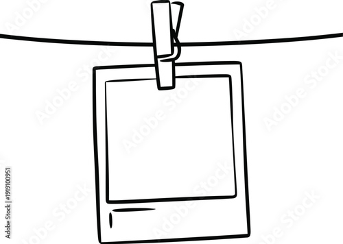 Hand drawn sketch of a blank instant photo frame hanging on a clothesline with a clothespin