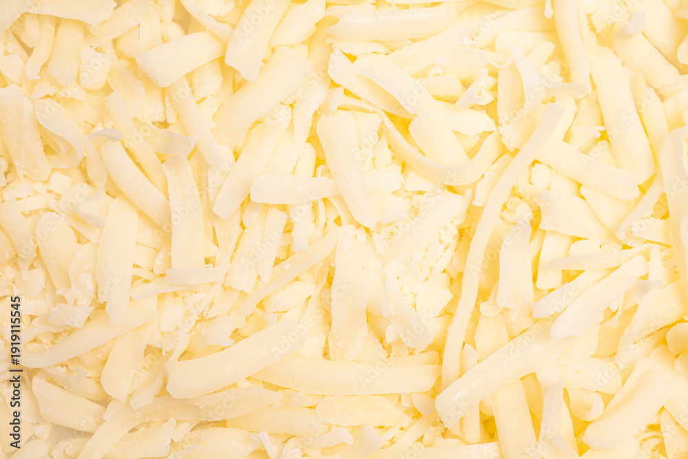 Obraz premium texture of grated cheese close-up