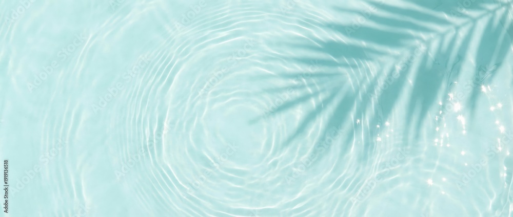 Obraz premium Calming water ripples and palm shadow tropical pool nature scene serene environment overhead view tranquility and relaxation