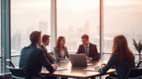 Blurred silhouette of a business team having a meeting in a modern office with a city skyline