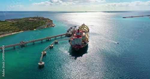 Aerial view of Malta's industrial port at Marsaxlokk. Liquefied natural gas tankers transporting it