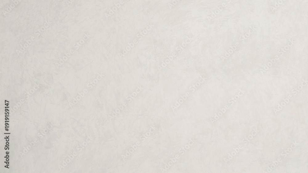 Obraz premium A soft, textured, off-white background with subtle variations in shade and light, creating a gentle and natural feel for design elements