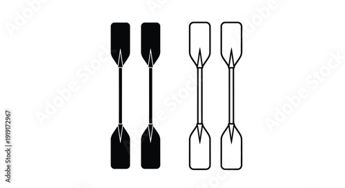 Two pairs of canoe or kayak paddles in contrasting styles