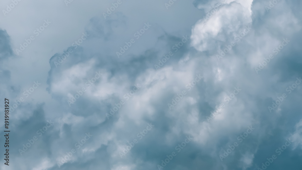 Obraz premium Overcast sky with dark grey and white storm clouds, natural weather background