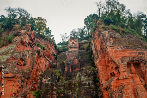 Leshan Giant Buddha in Sichuan, China. The Leshan Giant Buddha is a 71-meter tall stone statue. Сhina attractions.