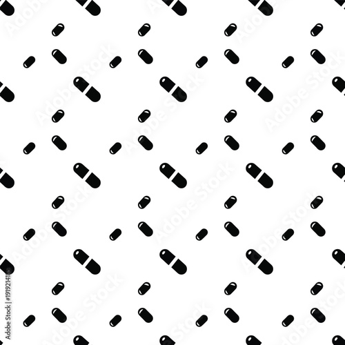Pattern of black and silver bullets scattered diagonally against a plain white background viewed from directly above