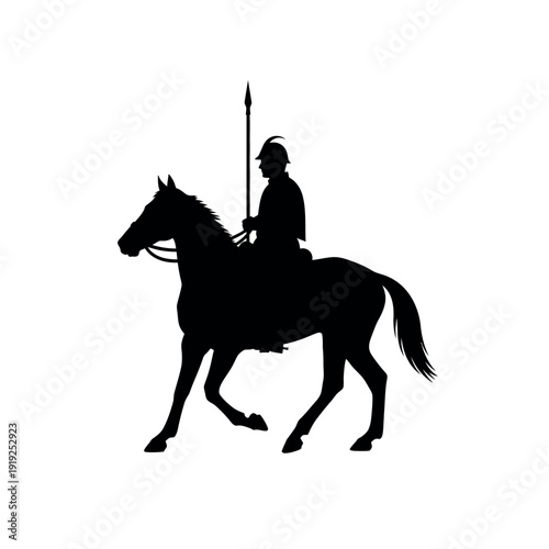 Silhouette of a rider on horseback with a spear.