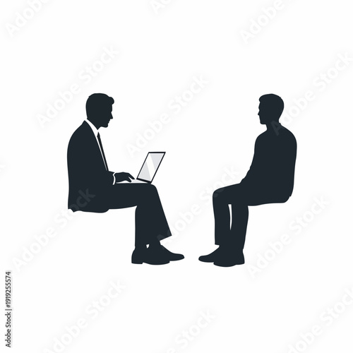 Two Men Sitting with Laptop in Meeting.