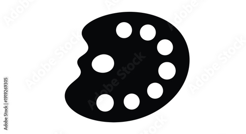 A black silhouette of a cookie with a bite taken out of it