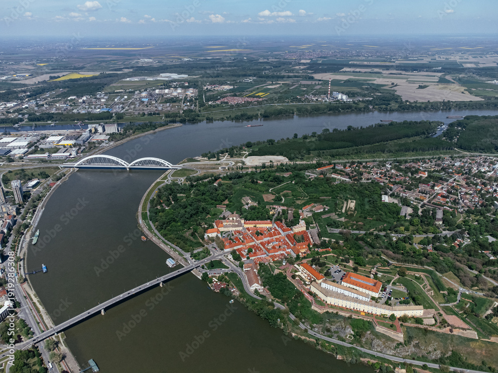 Obraz premium Drone areal shot of Petrovaradin fortress located on the Danube River bank across from Novi Sad. Serbia.