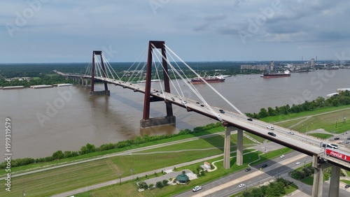 Φωτογραφία Cars traveling on Hale Boggs Memorial Bridge, a cable-stayed bridge over the Mississippi River in St