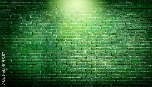 green brick wall with grungy texture and spotlight for background