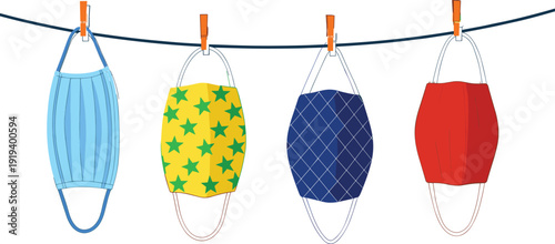Reusable fabric face masks hanging on a clothesline, clean and ready to wear for protection against viruses, germs, and airborne particles, essential personal protective equipment.