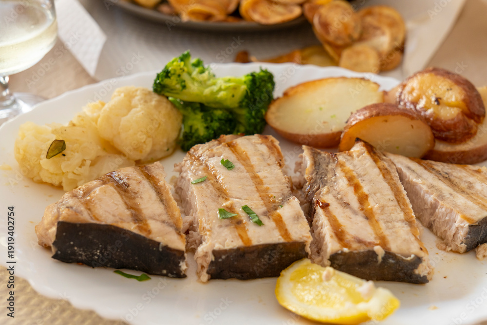 Φωτογραφία Grilled swordfish with broccoli and potatoes from the Azores islands at a restau