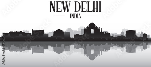 Black and white panoramic poster of the city skyline with misty background buildings and water reflection of NEW DELHI, INDIA