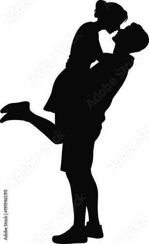 Silhouette of romantic young couple dancing together in an elegant pose, man and woman embracing for a wedding dance party