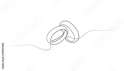 Wedding rings drawn by hand with a single line. A romantic, light illustration in doodle style.