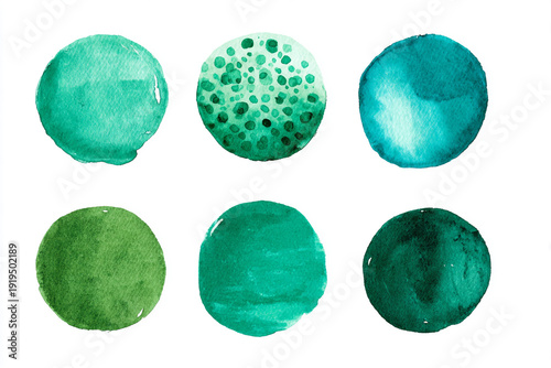 a collection of watercolor circles in various shades of green and blue on a white background