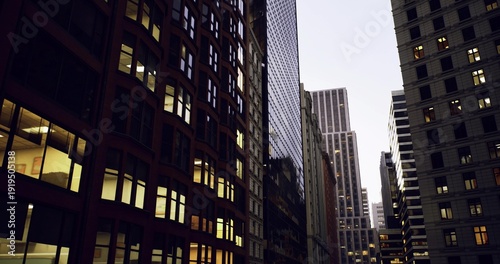 Εκτύπωση καμβά Dusk office complex illuminated with vigilant patrols, Twilight era architecture