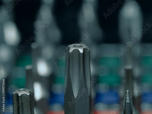 set of metal screws in a row