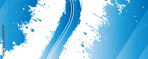Abstract blue paint splash and ink splatter background with brush strokes