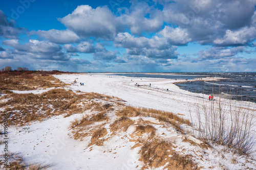Landscape of Baltic Sea beach in Mikoszewo at snowy winter. Poland