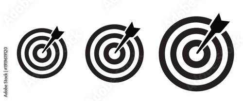Target and arrow glyph icon collection. Includes three different sizes of a dartboard with a dart hitting the bullseye. Created in solid black and white style with a monochrome palette.
