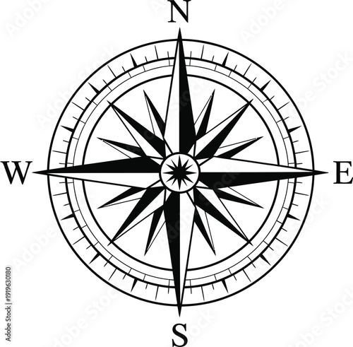 A black and white illustration of a compass rose