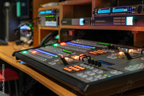 Tableau sur toile Professional video control room with broadcast equipment and mixing console