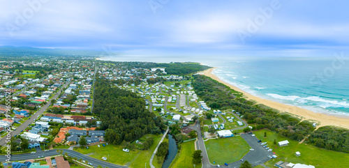 Drone aerial panoramic photograph of the Corrimal Beach Tourist Park located near Corrimal Beach north of Wollongong in East Corrimal in the Illawarra region of New South Wales, Australia.