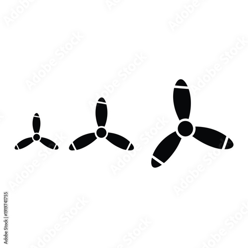 Three black airplane propellers of varying sizes shown in a row