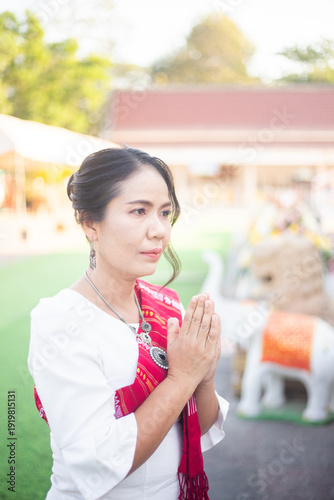 Women in northeastern Thailand wearing traditional costumes on important occasions.