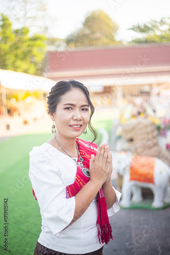 Women in northeastern Thailand wearing traditional costumes on important occasions.