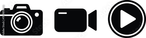 Set of black silhouette icons including photo camera, digital video camera and media play button for photography and film production,