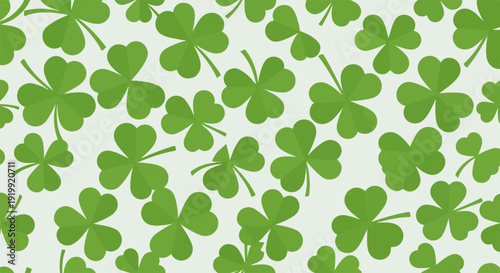 Vibrant green four leaf clover pattern on white background symbolizing luck and nature for st patrick's day designs and festive decorations with shamrocks