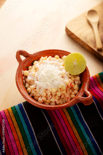 Wallpaper Mural Esquites. Corn kernels cooked and served with mayo, sour cream, lemon and chili powder, very popular street food in Mexico, also known as Elote en Vaso. The recipe varies depending on the region. Torontodigital.ca