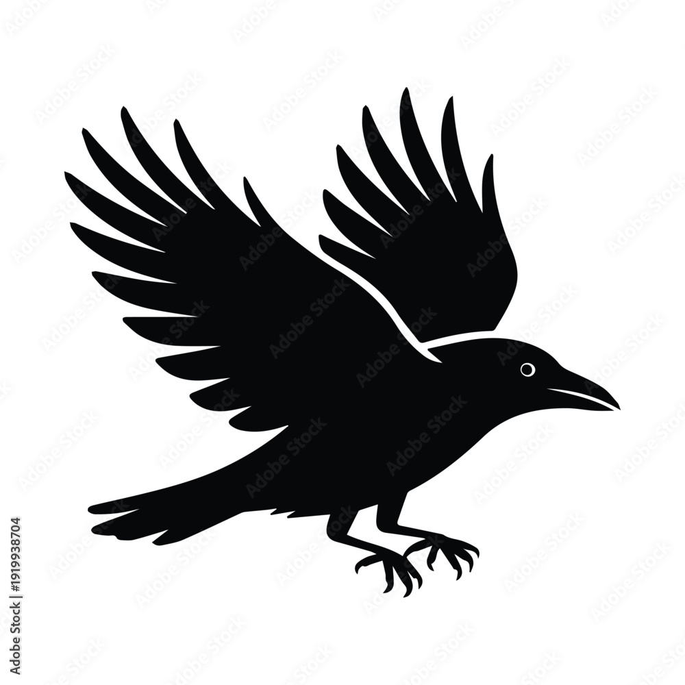 Fototapeta premium Majestic black bird in mid flight with wings spread wide