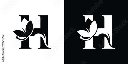 Black and white letter H with stylized leaf and flower
