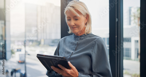 Free Download Business, tablet and window with designer woman in city workplace for agenda, planning or research. App, design and schedule with mature employee in office for digital report or online review - GFXLoad