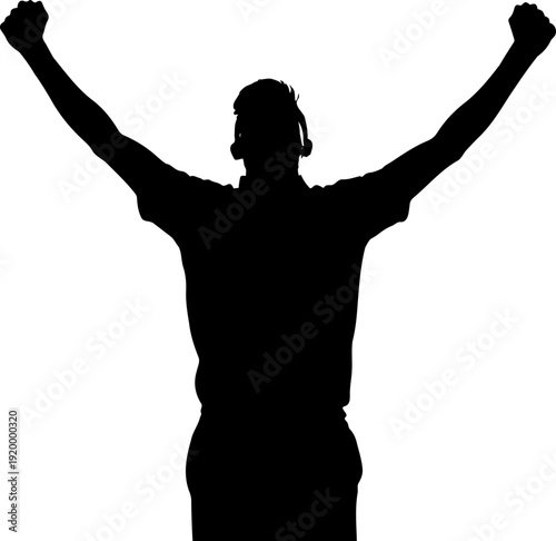 A triumphant man in silhouette with arms raised in victory and celebration